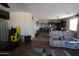 View of the living room and kitchen area showing the open floor plan at 18436 W Shasta St, Goodyear, AZ 85338