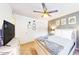 Calm bedroom with a queen-size bed, neutral colors, and soft carpet at 3002 N 70Th St # 120, Scottsdale, AZ 85251