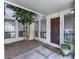 Welcoming entrance with a neatly landscaped area and a view of the front door at 3002 N 70Th St # 120, Scottsdale, AZ 85251