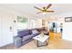 Inviting living room with a comfortable sofa and open layout to the kitchen at 3002 N 70Th St # 120, Scottsdale, AZ 85251