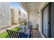 Relaxing patio area featuring a table and chairs, ideal for enjoying a peaceful outdoor setting at 3002 N 70Th St # 120, Scottsdale, AZ 85251