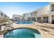 Inviting pool area featuring both a large pool and a separate spa, surrounded by comfortable seating at 3002 N 70Th St # 120, Scottsdale, AZ 85251