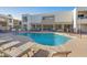 Resort-style pool area with lounge chairs and inviting clear water, perfect for relaxation at 3002 N 70Th St # 120, Scottsdale, AZ 85251