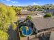 Aerial view of a home with a private backyard oasis featuring a pool and gazebo at 32881 N Hidden Canyon Dr, San Tan Valley, AZ 85144