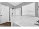 Clean bathroom featuring a bathtub and shower stall with a glass door at 32881 N Hidden Canyon Dr, San Tan Valley, AZ 85144