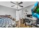Bedroom with wood floors and a ceiling fan at 32881 N Hidden Canyon Dr, San Tan Valley, AZ 85144