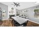 Elegant dining area features a fireplace, large white table, and stylish decor for Gathering gatherings at 32881 N Hidden Canyon Dr, San Tan Valley, AZ 85144