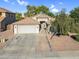Charming single-Gathering home with a well-manicured lawn and a spacious two-car garage at 32881 N Hidden Canyon Dr, San Tan Valley, AZ 85144