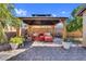 Outdoor patio with comfortable lounge seating and decorative plants at 32881 N Hidden Canyon Dr, San Tan Valley, AZ 85144