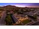 Expansive estate with mountain views, lush landscaping, sparkling pool, and ample privacy at 3981 E Runaway Bay Pl, Queen Creek, AZ 85142