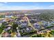 Aerial view of the luxurious residential neighborhood featuring multiple lakes and scenic desert views at 3981 E Runaway Bay Pl, Queen Creek, AZ 85142