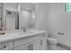 Modern bathroom features a white vanity, tiled shower, and stylish fixtures for a clean, updated look at 3981 E Runaway Bay Pl, Queen Creek, AZ 85142