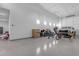 Spacious garage interior with ample storage space for vehicles and other belongings at 3981 E Runaway Bay Pl, Queen Creek, AZ 85142