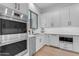 Bright kitchen with stainless steel appliances and white cabinets at 3981 E Runaway Bay Pl, Queen Creek, AZ 85142
