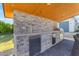 This outdoor kitchen features a built-in grill, mini-fridge, and beer tap for entertaining at 3981 E Runaway Bay Pl, Queen Creek, AZ 85142