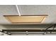 Image of the attic access panel from inside the garage at 12836 N 39Th Ln, Phoenix, AZ 85029