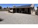Backyard with gravel, covered patio and solar panels at 12836 N 39Th Ln, Phoenix, AZ 85029