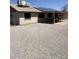 Backyard with gravel, block fence, solar panels and covered patio at 12836 N 39Th Ln, Phoenix, AZ 85029