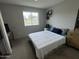 Comfortable bedroom with carpeted floors and a bright window at 12836 N 39Th Ln, Phoenix, AZ 85029