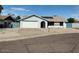 Well-maintained single Gathering house with a two-car garage and a neat front lawn at 12836 N 39Th Ln, Phoenix, AZ 85029