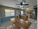 Spacious kitchen features an island and an open layout to the living room at 12836 N 39Th Ln, Phoenix, AZ 85029