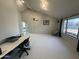 Bright living room featuring vaulted ceilings, large windows, and neutral walls perfect for a welcoming atmosphere at 12836 N 39Th Ln, Phoenix, AZ 85029