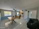 The spacious living room features tile floors and an open floorplan concept at 12836 N 39Th Ln, Phoenix, AZ 85029