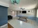 Open concept layout with kitchen island, dining area, and living room creates an inviting atmosphere at 12836 N 39Th Ln, Phoenix, AZ 85029
