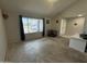 Bright living room with vaulted ceiling, large windows, and tile entryway at 12836 N 39Th Ln, Phoenix, AZ 85029