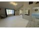 Bright living room features neutral tones, a large window, and an open floor plan at 12836 N 39Th Ln, Phoenix, AZ 85029