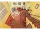 Elegant entryway features hardwood floors, high ceilings, and a grand staircase at 21483 N 65Th Ave, Glendale, AZ 85308