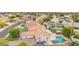 Aerial view of a backyard featuring a pool, patio, and playground at 2431 E Laurel St, Mesa, AZ 85213