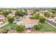 Aerial view of backyard with pool, patio, playground, and lush landscaping at 2431 E Laurel St, Mesa, AZ 85213