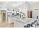 Open kitchen with stainless steel appliances, granite countertops, and a large island with seating at 2431 E Laurel St, Mesa, AZ 85213