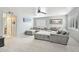 Spacious living room with neutral paint, shutters, art, and a comfortable sectional sofa at 2431 E Laurel St, Mesa, AZ 85213
