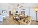 Bright and spacious living room featuring stylish furnishings, hardwood floors, and an open layout at 2431 E Laurel St, Mesa, AZ 85213
