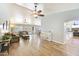 Expansive living room with hardwood floors, an open layout, and lots of natural light at 2431 E Laurel St, Mesa, AZ 85213