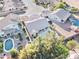 Stunning aerial view of a home with a refreshing pool, spa, and lush landscaping at 329 S Marin Dr, Gilbert, AZ 85296