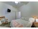 Bedroom features closet, comfortable bed and side table with lamp at 329 S Marin Dr, Gilbert, AZ 85296