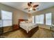 Comfortable bedroom with ceiling fan, and plenty of natural light at 329 S Marin Dr, Gilbert, AZ 85296