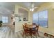 Breakfast nook featuring a wooden dining table, and views into living room and kitchen at 329 S Marin Dr, Gilbert, AZ 85296