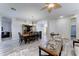 Spacious open concept living and dining area with stylish furnishings at 329 S Marin Dr, Gilbert, AZ 85296