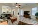 Open concept living area showcasing wood-look flooring, leather seating, and open flow at 329 S Marin Dr, Gilbert, AZ 85296