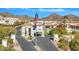 Welcoming community entrance with an American flag and meticulously maintained landscaping at 3800 E Lincoln Dr # 37, Phoenix, AZ 85018