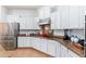Well-equipped kitchen features stainless steel appliances, granite countertops, and ample storage space at 404 E Coconino Pl, Chandler, AZ 85249