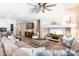 Open living area with a large sectional sofa, bar, and entertainment center creating a cozy atmosphere at 404 E Coconino Pl, Chandler, AZ 85249