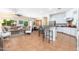 Open concept living space with kitchen, dining, and living areas promoting seamless interaction at 404 E Coconino Pl, Chandler, AZ 85249
