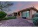 Expansive backyard featuring manicured landscaping and a covered patio area at 41715 N River Bend Rd, Phoenix, AZ 85086