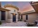 Elegant front entrance with a rotunda, iron door, and welcoming courtyard, offering privacy and style at 41715 N River Bend Rd, Phoenix, AZ 85086