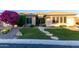 Charming home with a well-manicured lawn and inviting stone walkway at 41715 N River Bend Rd, Phoenix, AZ 85086